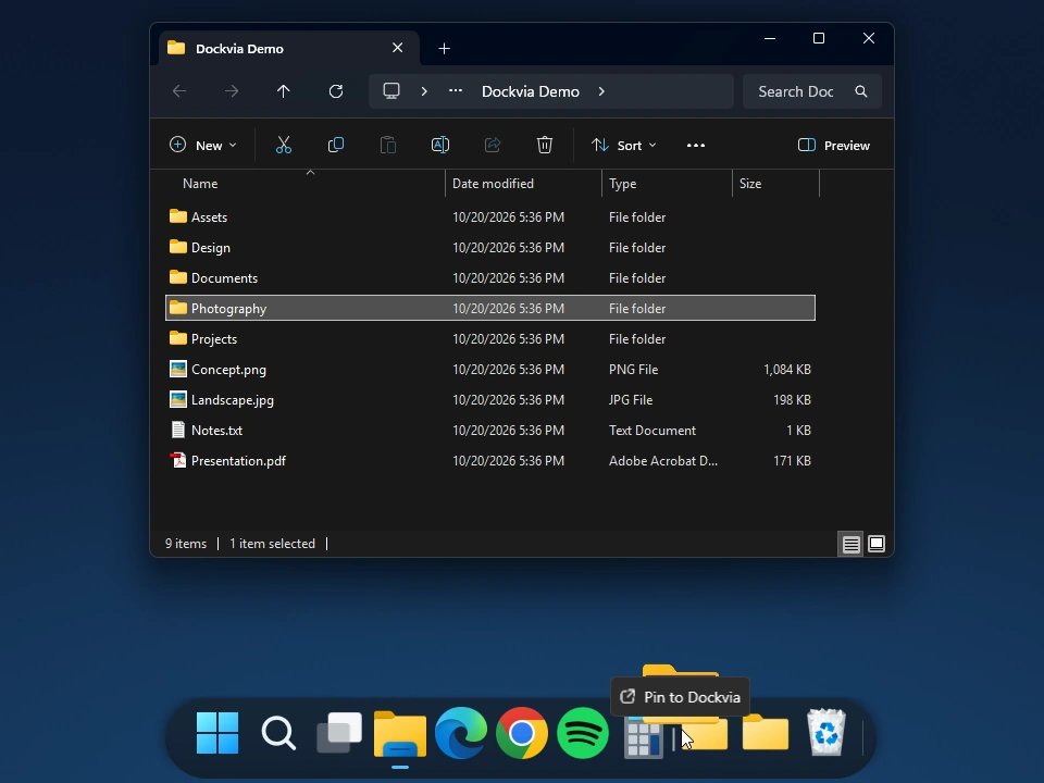 Photography dragged from File Explorer to the Dock, with Pin to Dockvia feedback visible
