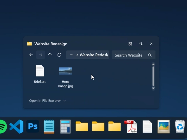 Website Redesign opened inside the Folder Stack, revealing Brief.txt and Hero Image.jpg